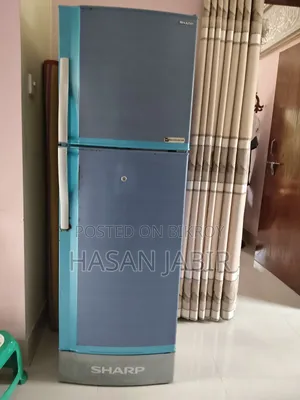 Sharp
Refrigerator-Freezer
Model:
Sj-Ek25s-Bl