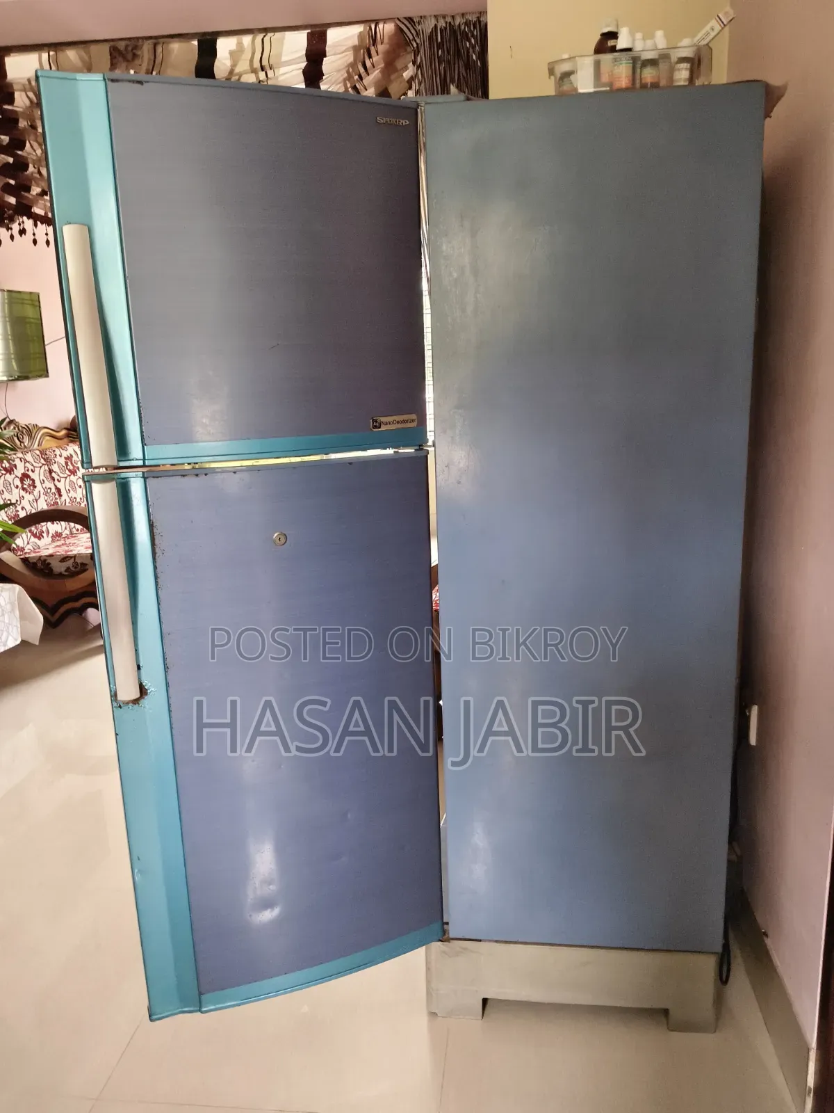 Sharp
Refrigerator-Freezer
Model:
Sj-Ek25s-Bl