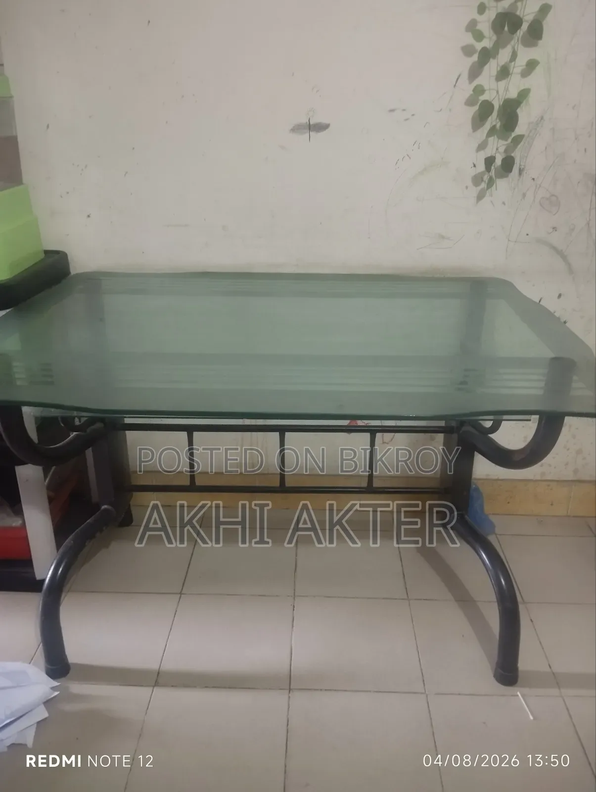 Dining table for sale with 4 chairs, including 3 matching chairs.