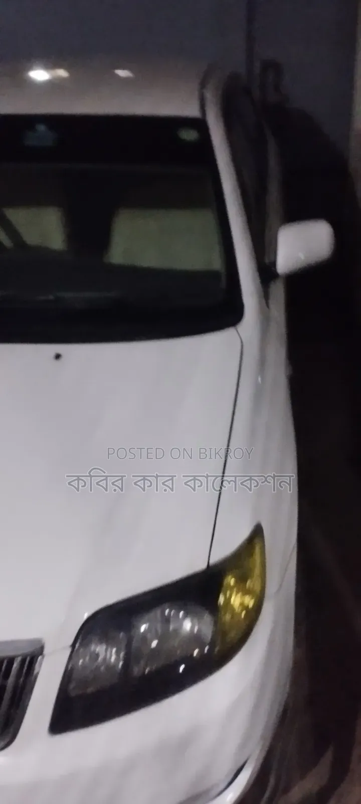 টয়োটা করোল্লা ২০০৪ সাদা