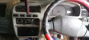 সুজুকি আল্টো ২০১৩ লাল