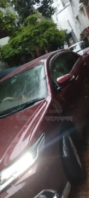 টয়োটা প্রিমিও ২০১০ মেরুন