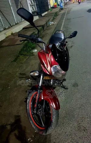 বাজাজ ডিসকভার ১০০ ২০১৫ লাল