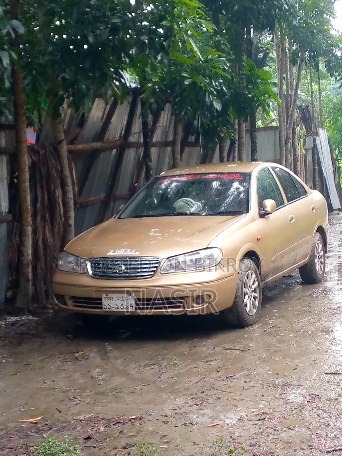 2025 Gold Nissan Sunny