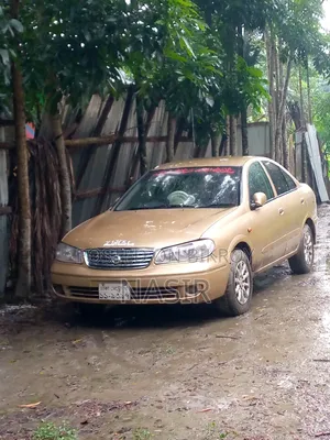 2025 Gold Nissan Sunny
