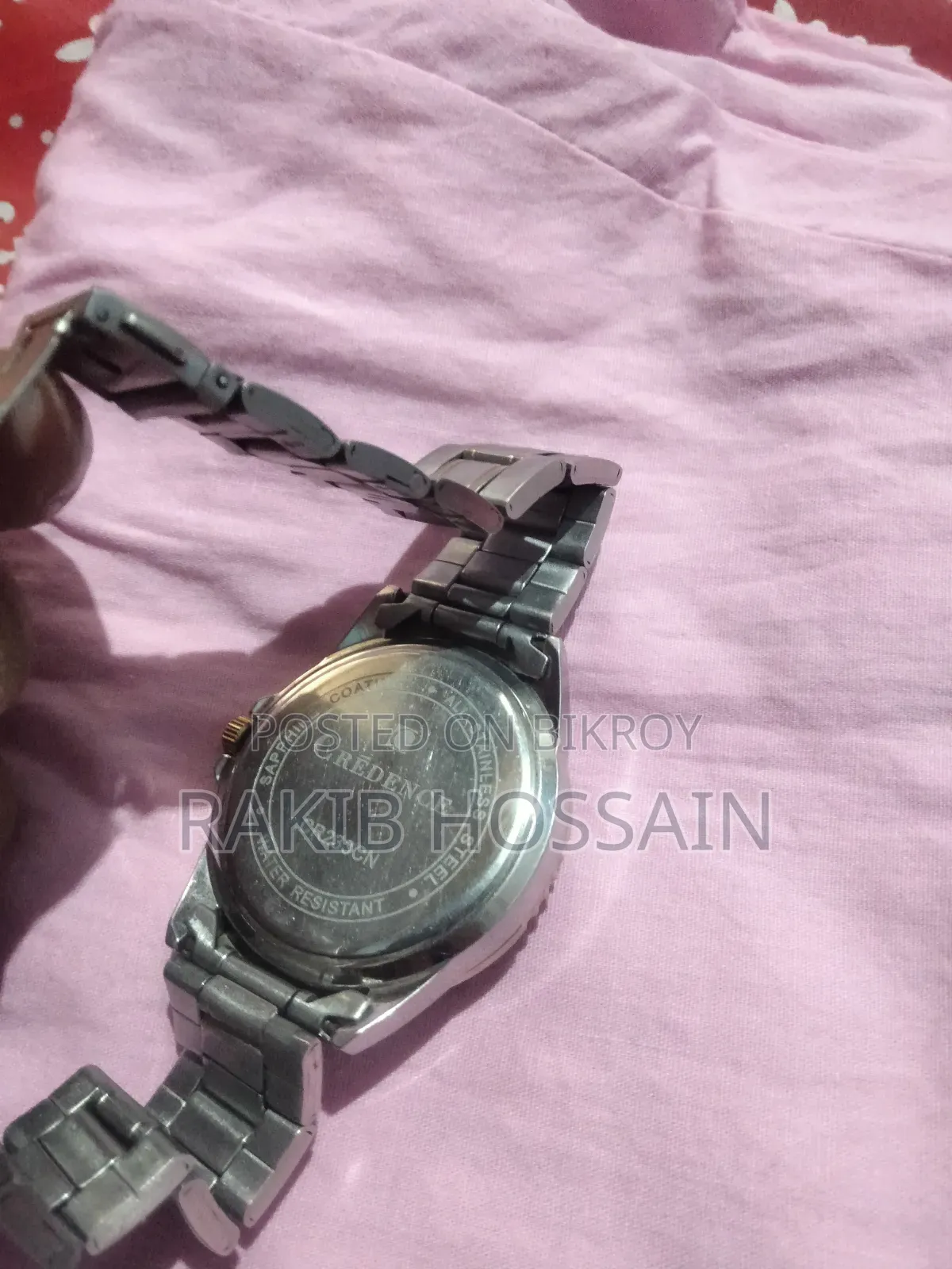 অথেনটিক ঘড়ি