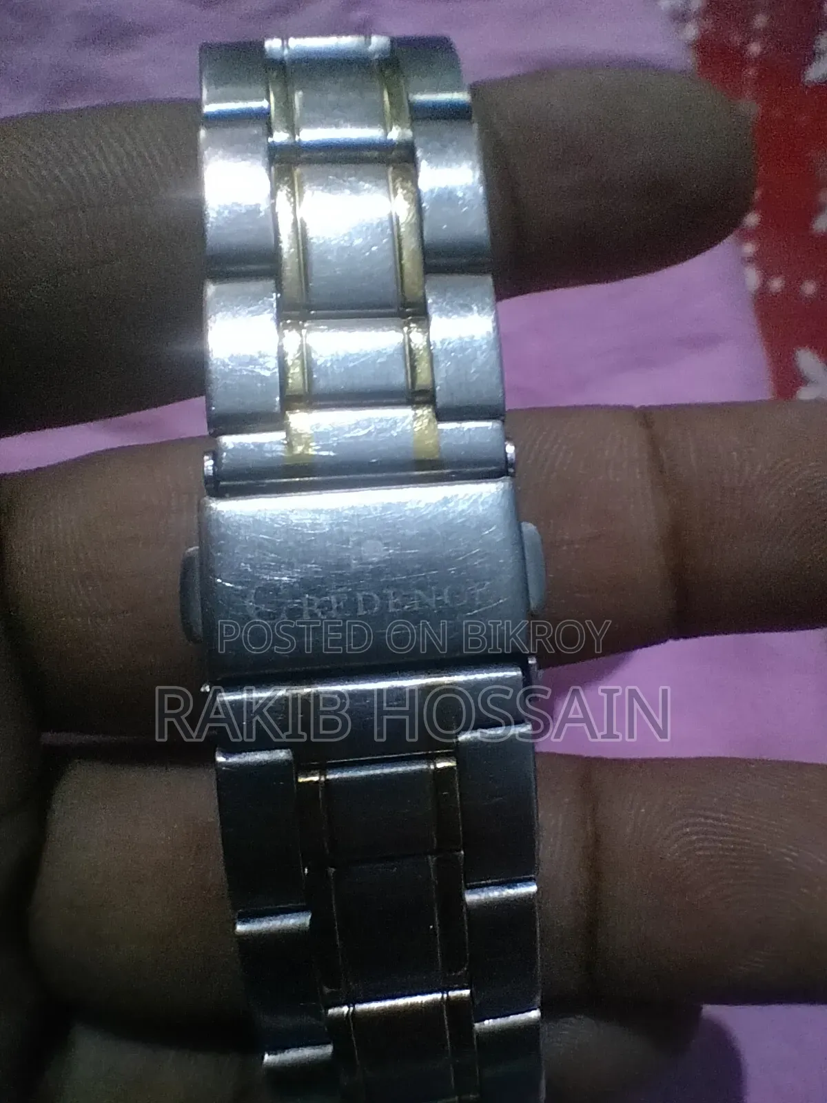 অথেনটিক ঘড়ি