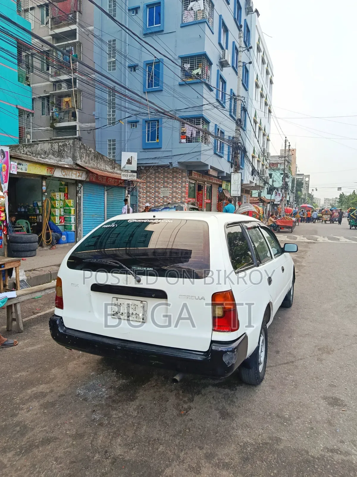 টয়োটা করোলা ২০০২ হোয়াইট