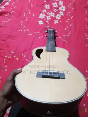 JSM Ukulele One String is Torn If Anyone is Interested to Take Message