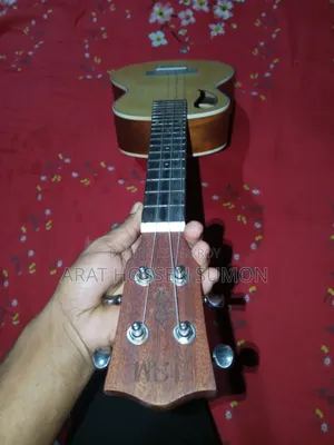 JSM Ukulele One String is Torn If Anyone is Interested to Take Message