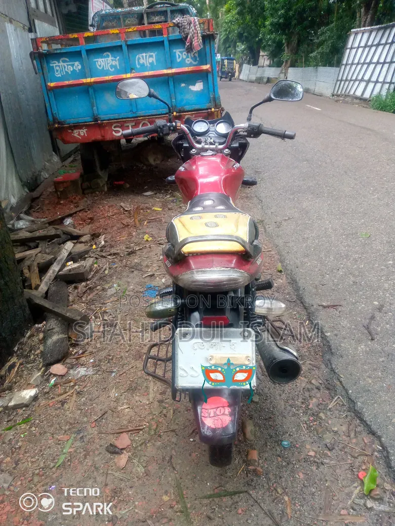 বাজাজ ডিসকভার ১০০ ২০১৭ রেড