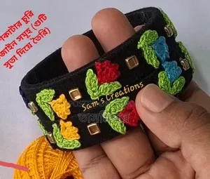 This is a handmade Sam's Creations black