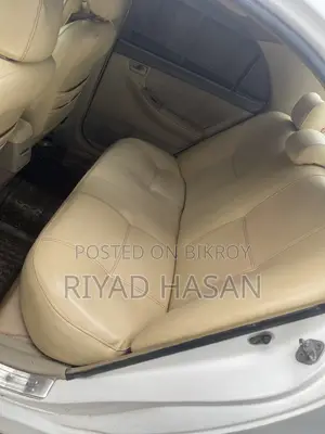 টয়োটা করোল্লা সেডান ২০০৫ সাদা