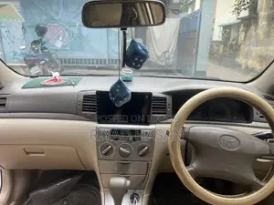 টয়োটা করোল্লা সেডান ২০০৫ সাদা