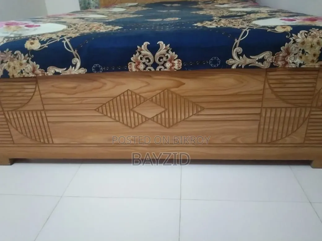 Used board cot with mattress