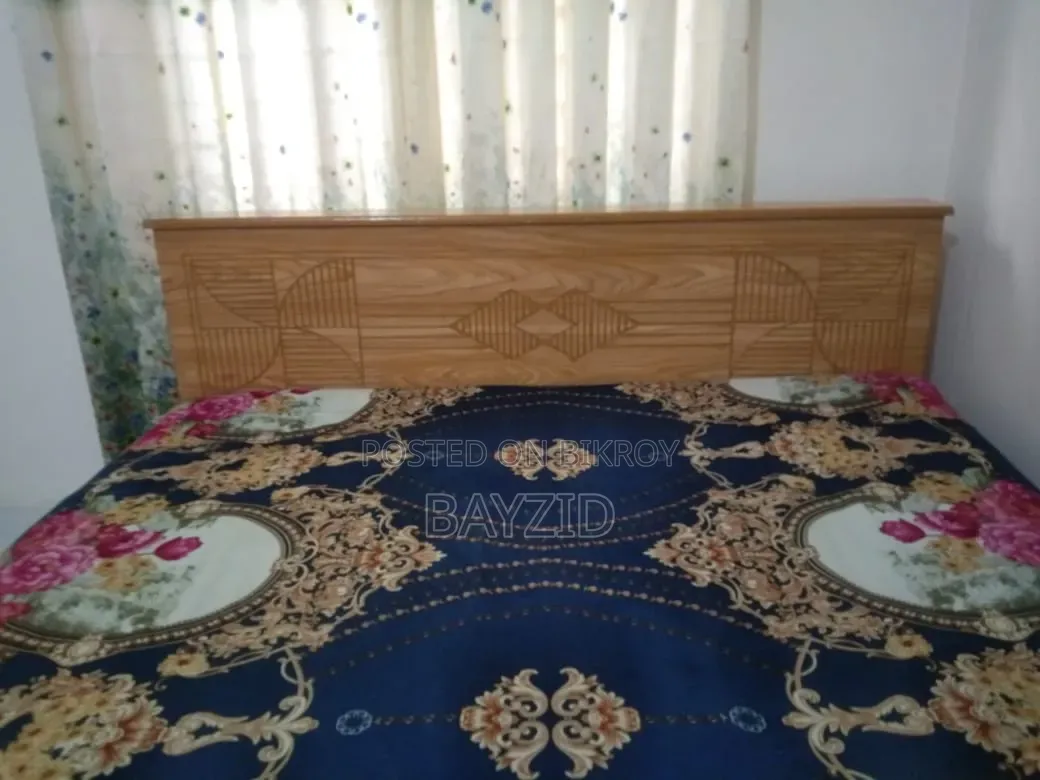 Used board cot with mattress