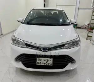 টয়োটা করোল্লা হাইব্রিড ২০২৫ হোয়াইট