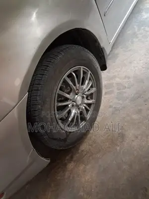 টয়োটা করোল্লা সেডান ২০০৩ সিলভার