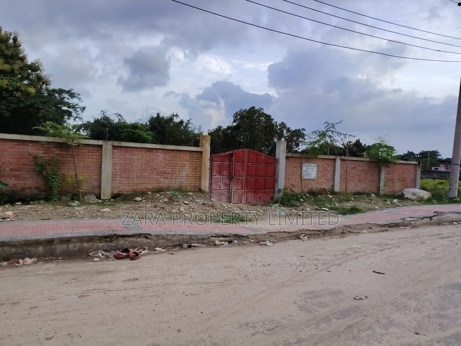 5 katha plot on 75 ft road next to 300 ft road.