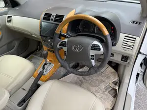 টয়োটা অ্যাক্সিও ১.৫ জি টু হুইল ড্রাইভ ২০১১ সাদা