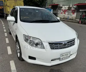 টয়োটা অ্যাক্সিও ১.৫ জি টু হুইল ড্রাইভ ২০১১ সাদা