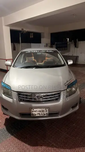 টয়োটা অ্যাক্সিও ১.৫ জি ফোর-হুইল ড্রাইভ ২০১০ সিলভার