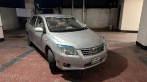 টয়োটা অ্যাক্সিও ১.৫ জি ফোর-হুইল ড্রাইভ ২০১০ সিলভার