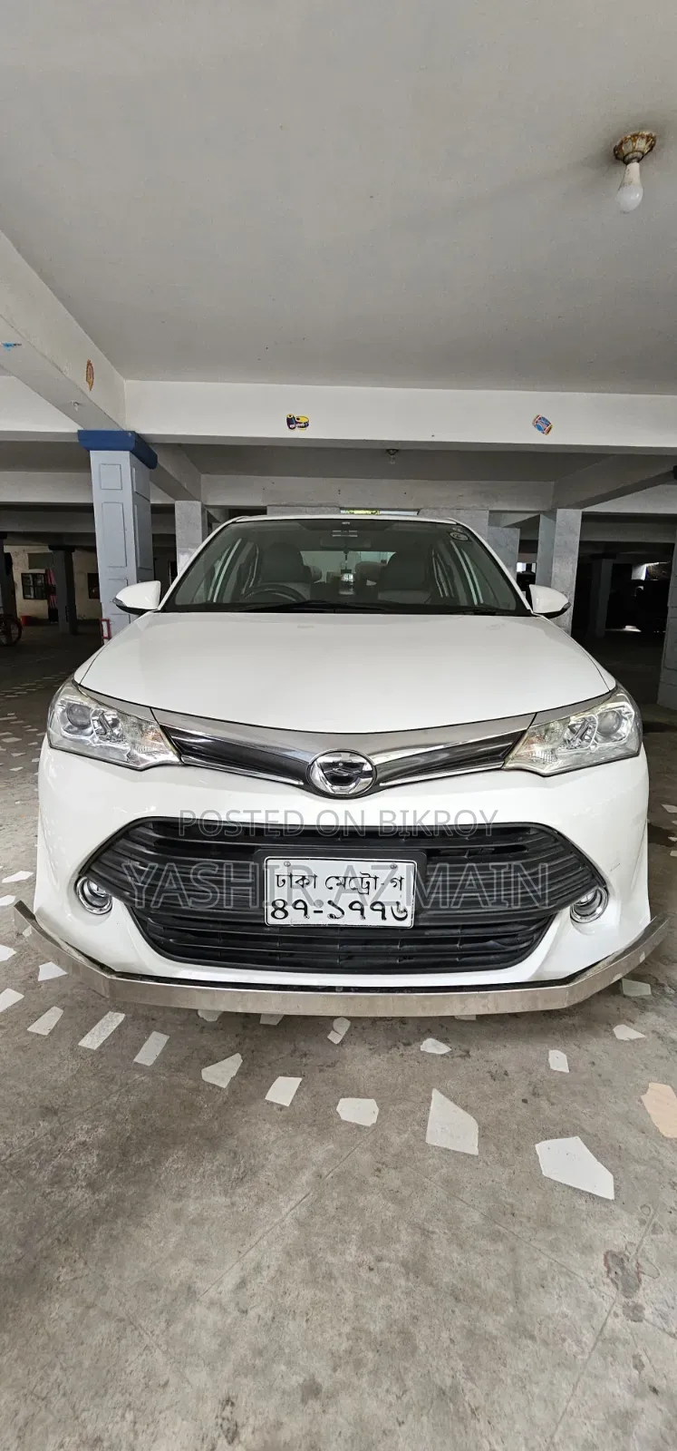 টয়োটা অ্যাক্সিও ২০১৬ সাদা