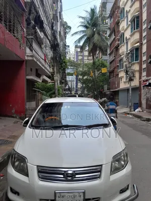 টয়োটা এক্সিও ২০১০ সাদা