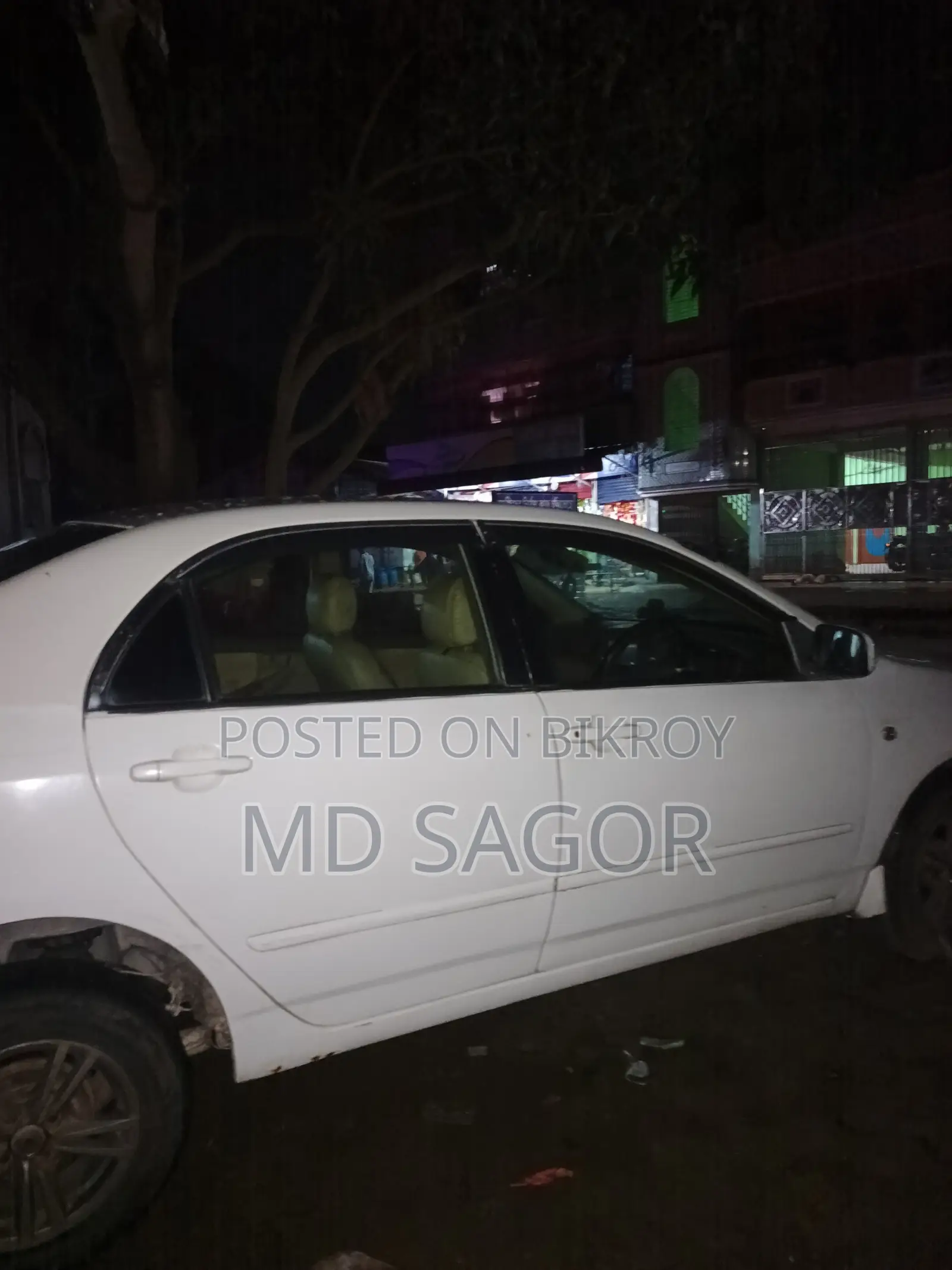 টয়োটা করোল্লা ২০০৫ সাদা