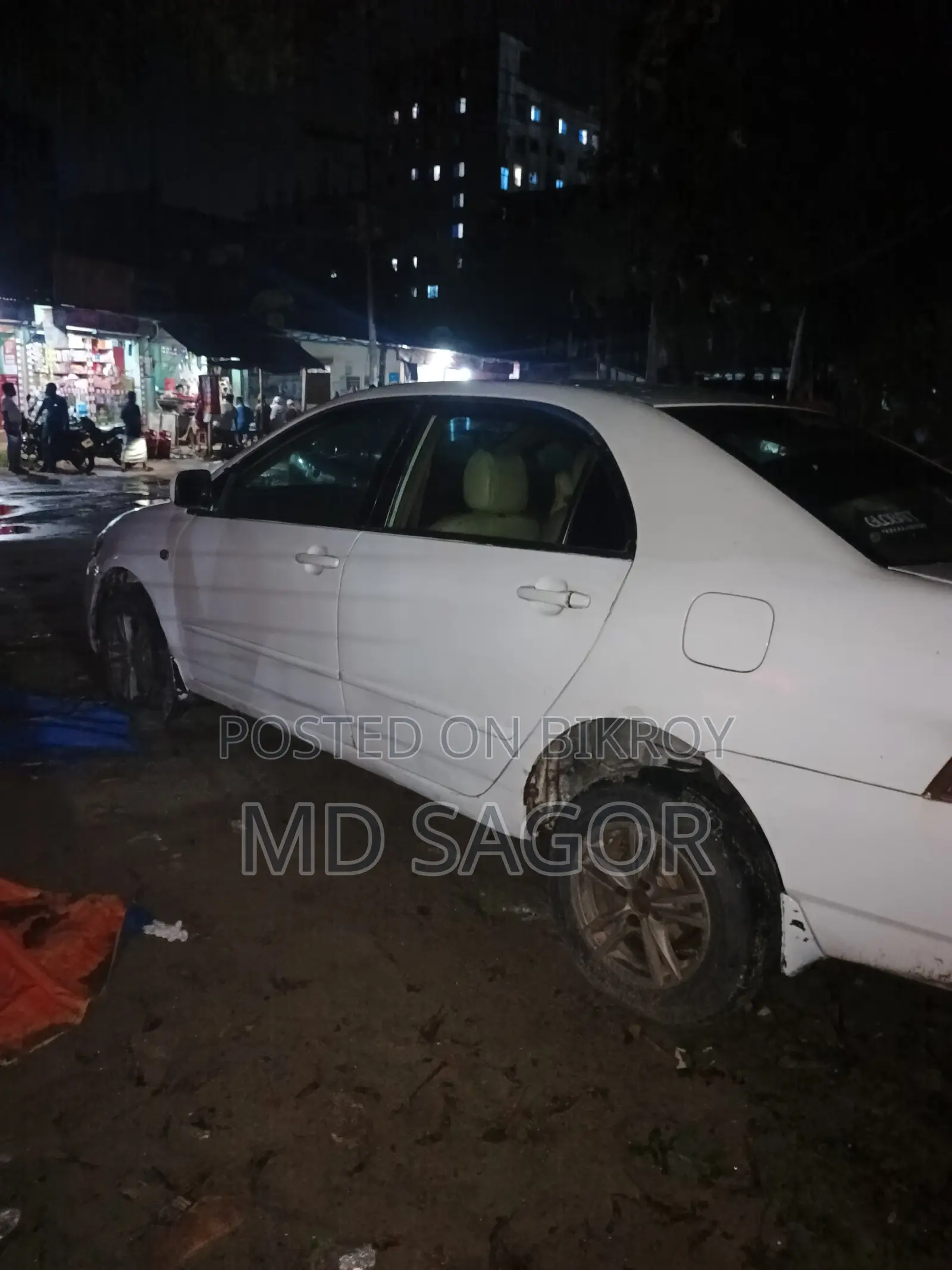 টয়োটা করোল্লা ২০০৫ সাদা