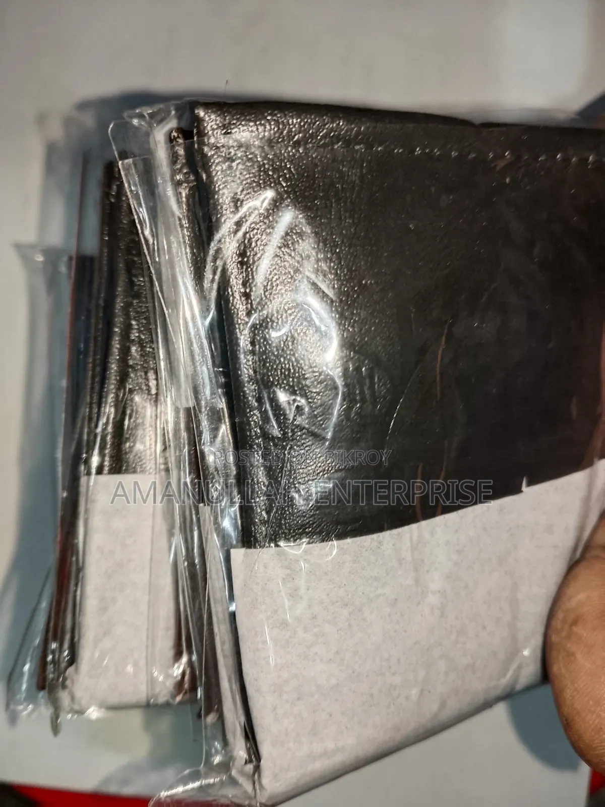 আমানুল্লাহ এন্টারপ্রাইজ পুরুষদের জেনুইন এমবসড ওয়ালেট। (১৫ পিস)