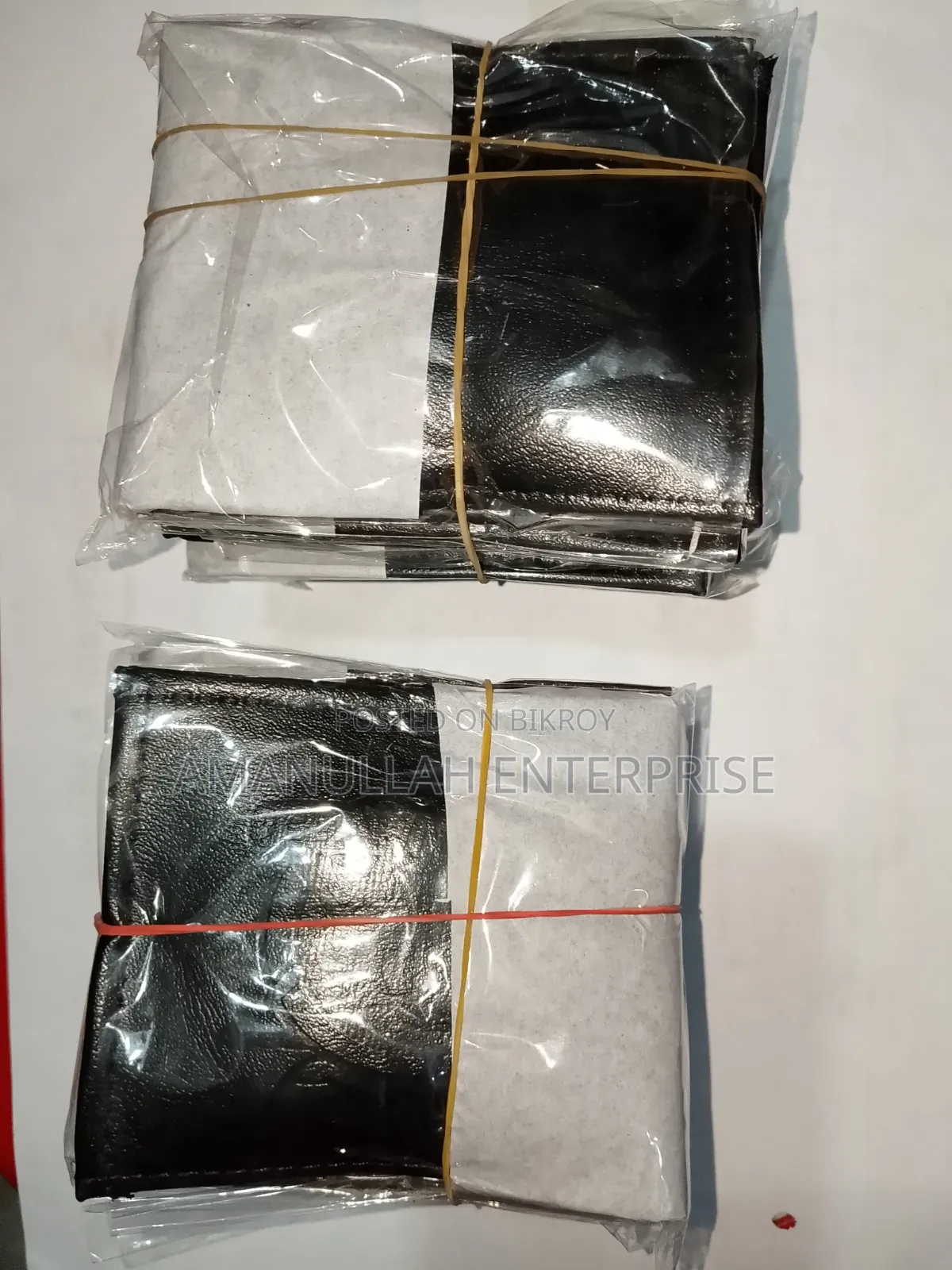 আমানুল্লাহ এন্টারপ্রাইজ পুরুষদের জেনুইন এমবসড ওয়ালেট। (১৫ পিস)