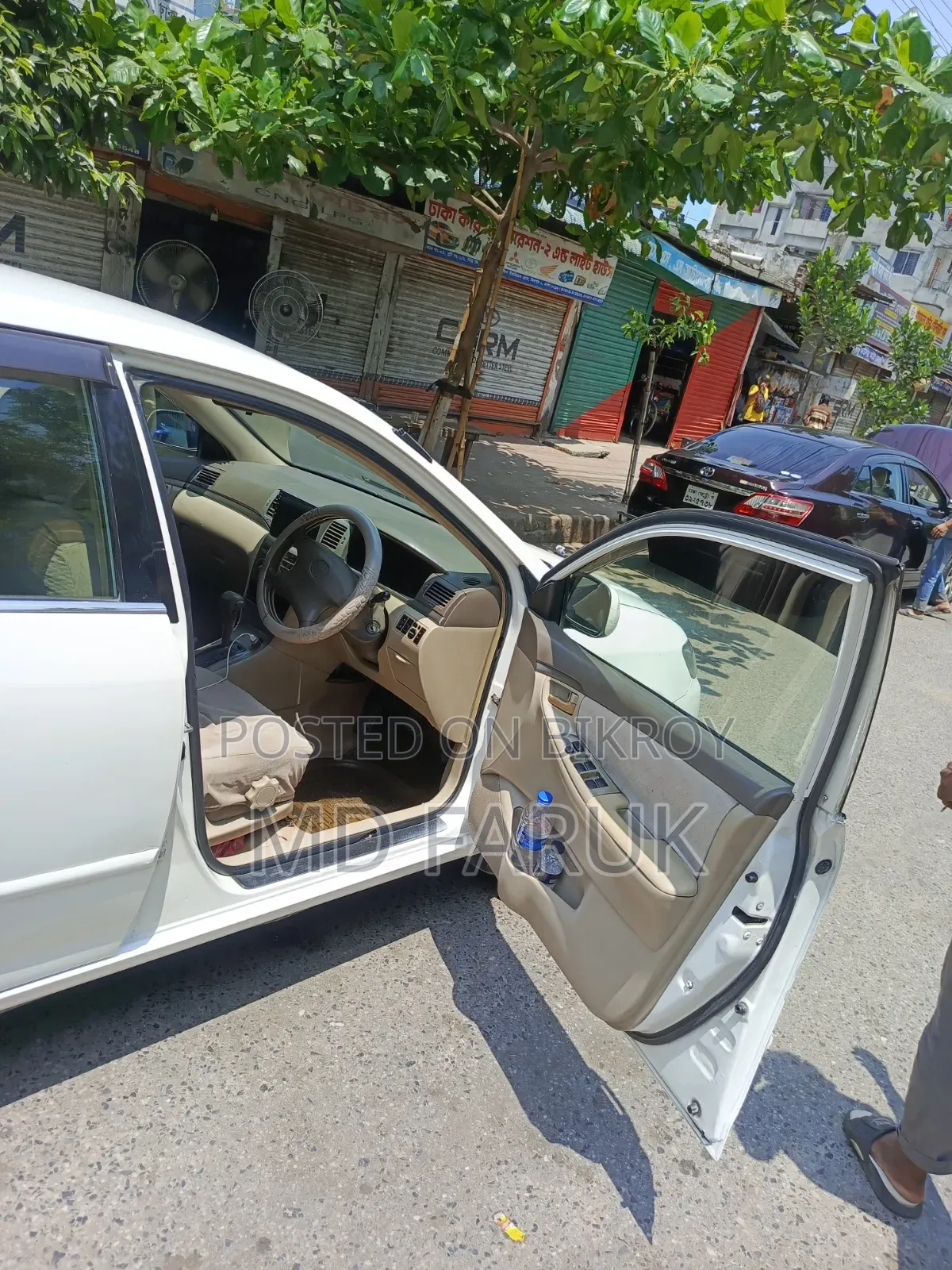 টয়োটা করোল্লা ২০০৪ সাদা