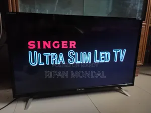 Singer Ultra Slim TV With Original Remote