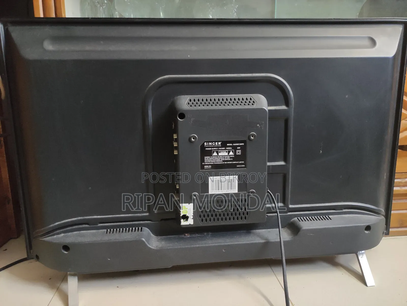Singer Ultra Slim TV With Original Remote